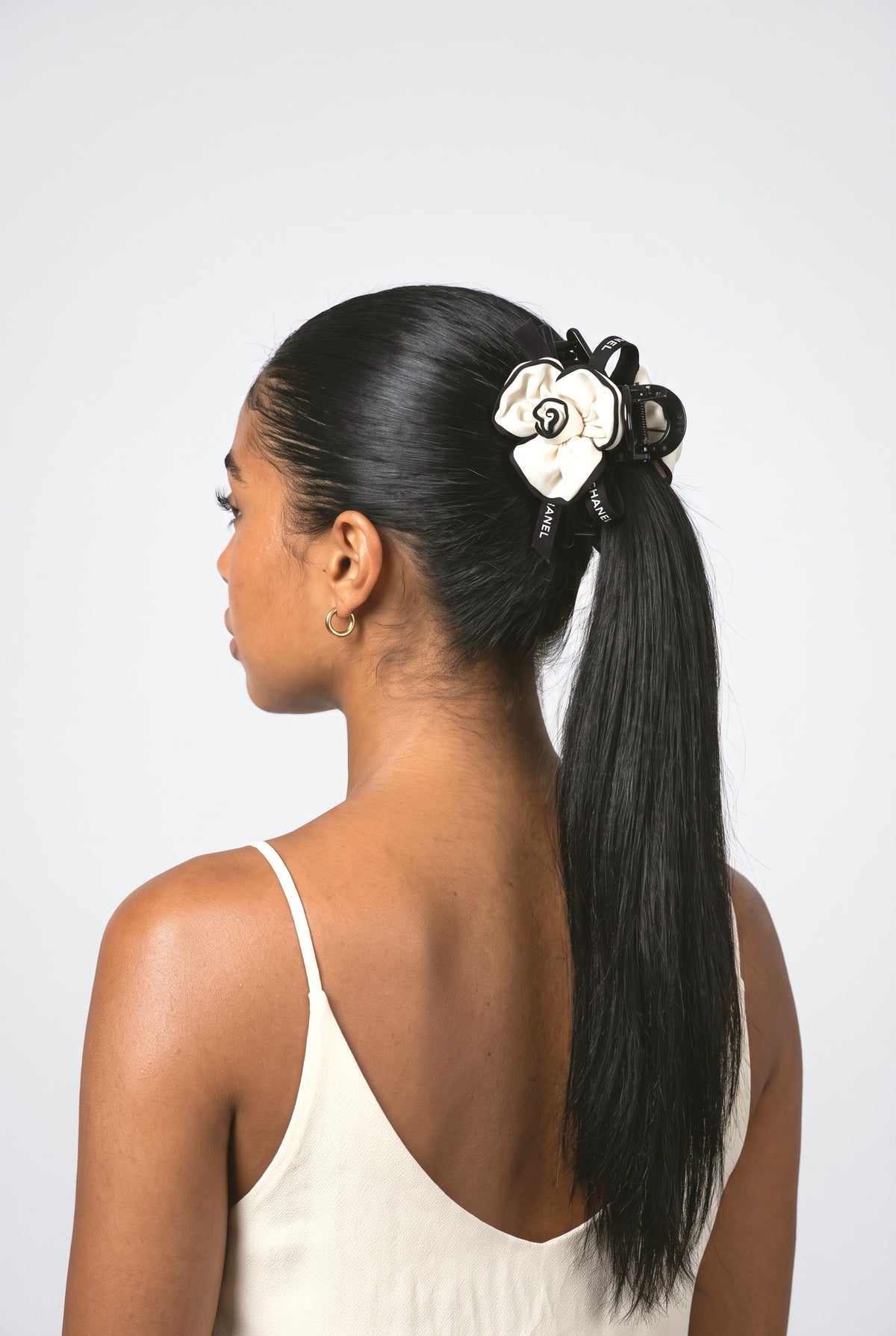 Camellia Hairpin, worn, shown to scale
