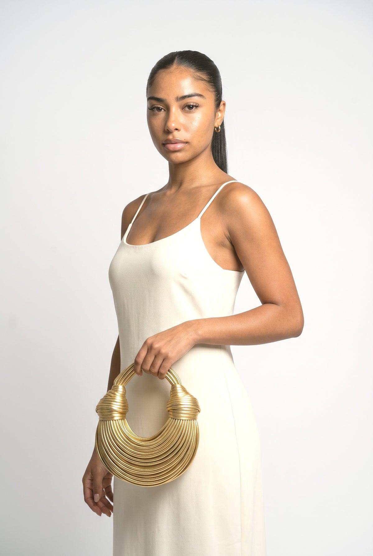Braided Knotted Dumpling Cloud Crossbody Bag, worn, shown to scale
