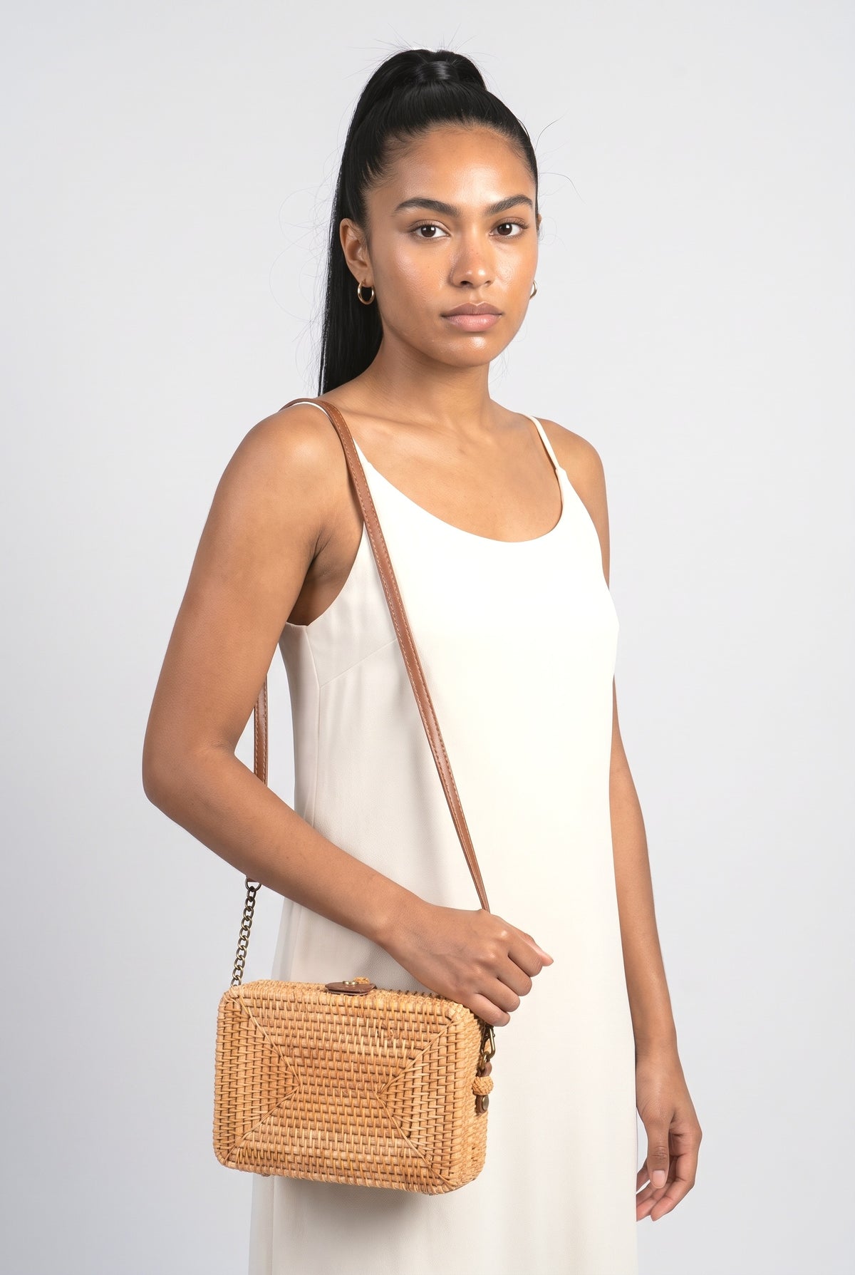 Free Living Bamboo Crossbody, worn, shown to scale