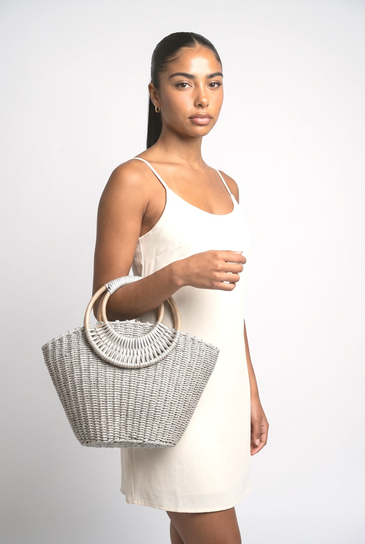 Round Rattan Handle Straw Bag, worn, shown to scale