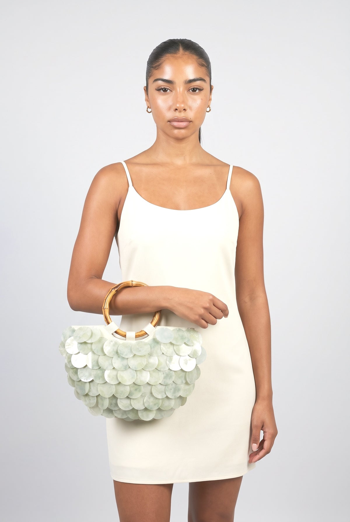 Bamboo Handle Shell Disc Statement Handbag, worn, shown to scale