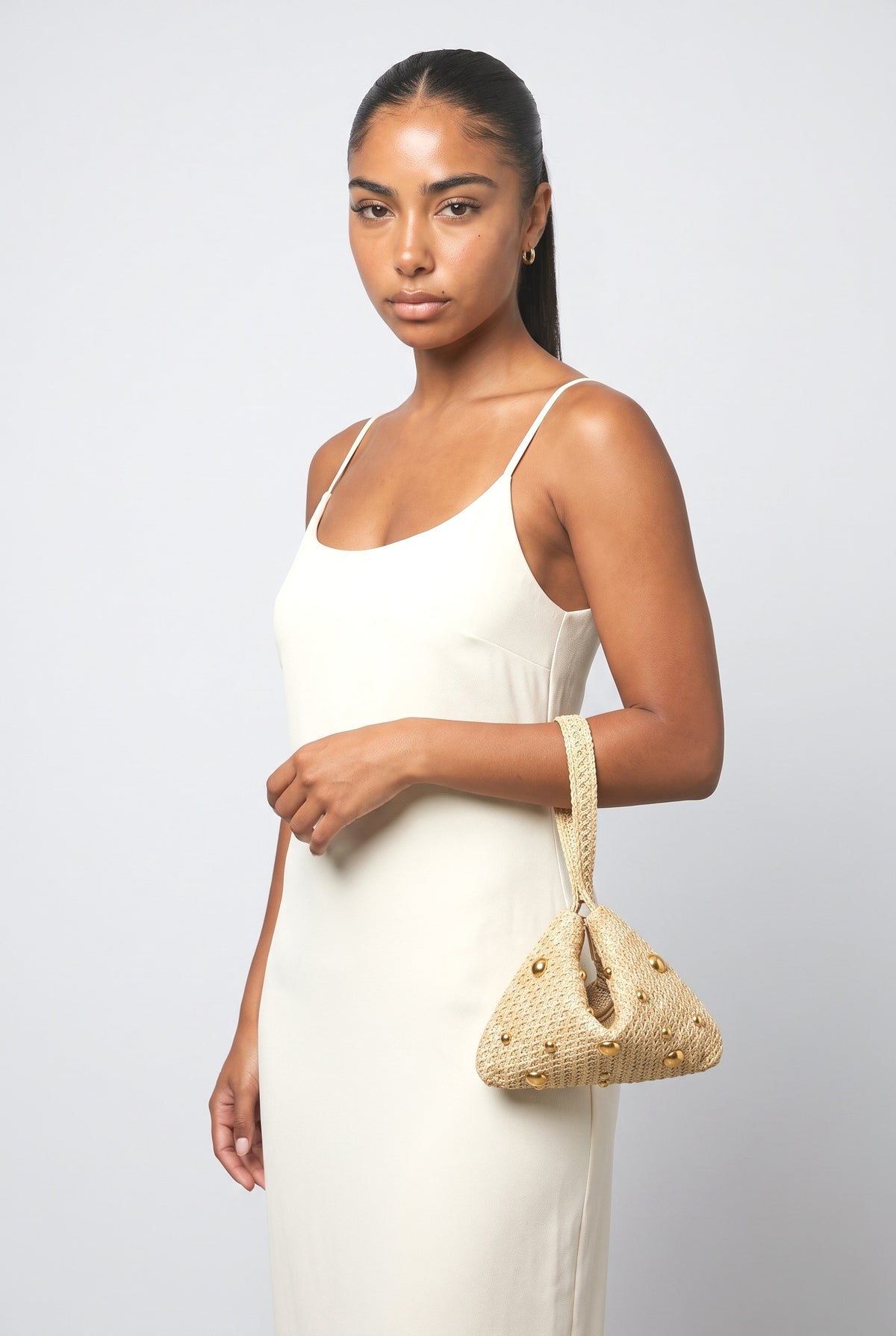 Beaded Woven Straw Wristlet Bag, worn, shown to scale
