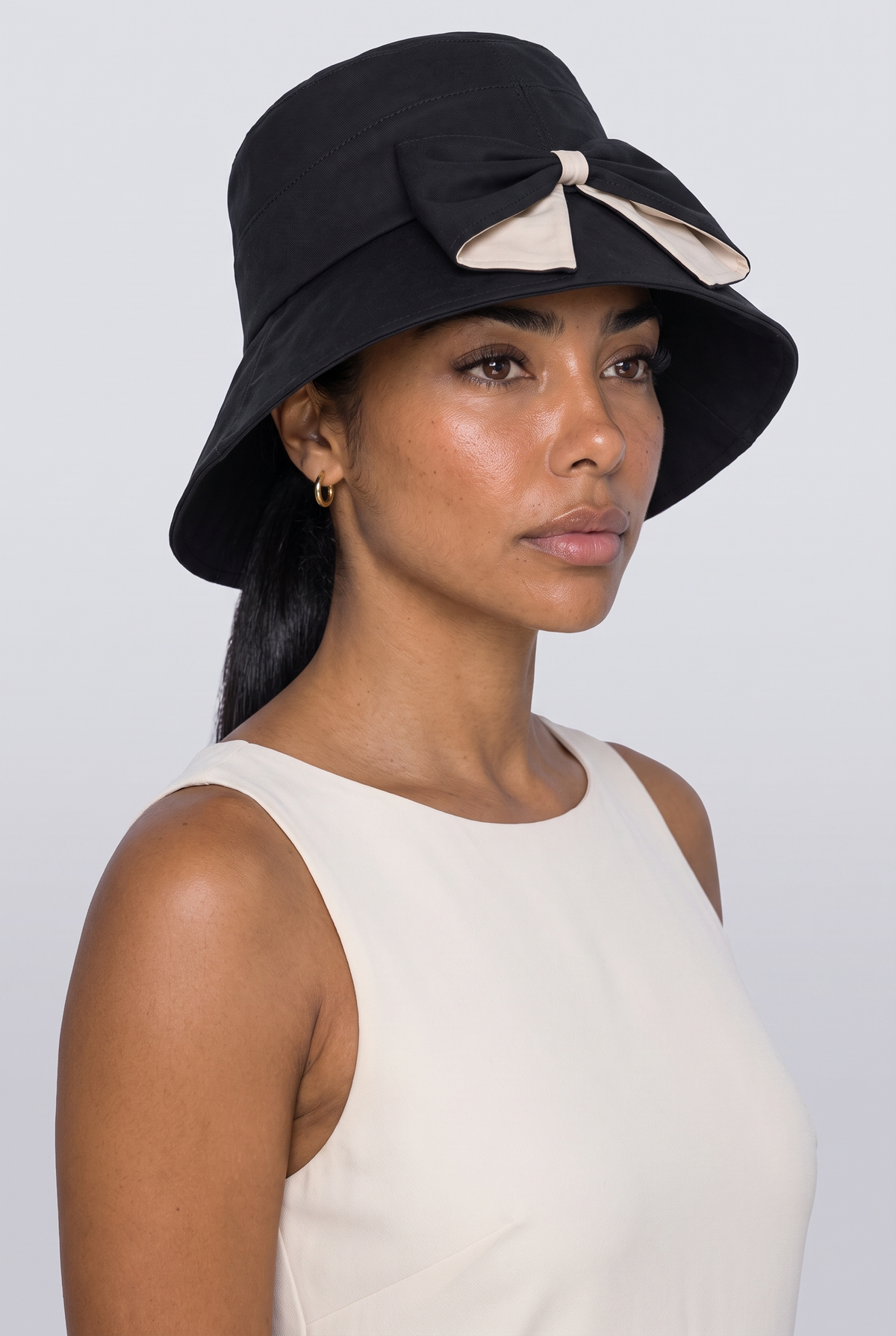 Beanie, worn, shown to scale