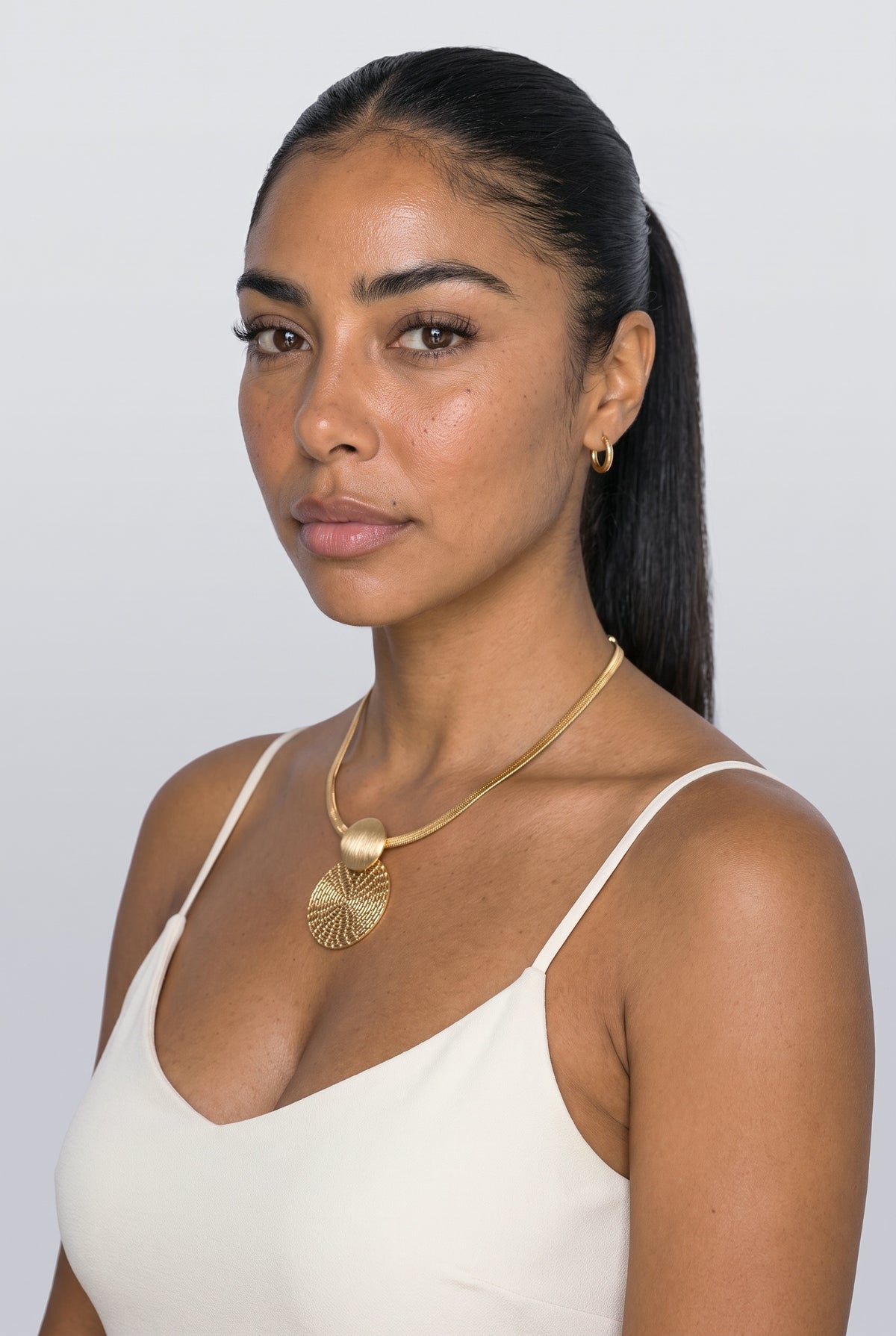 Necklace, worn, shown to scale