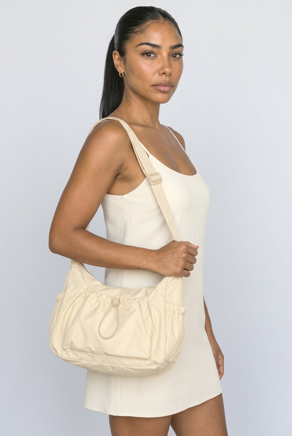 Crossbody Bag, worn, shown to scale