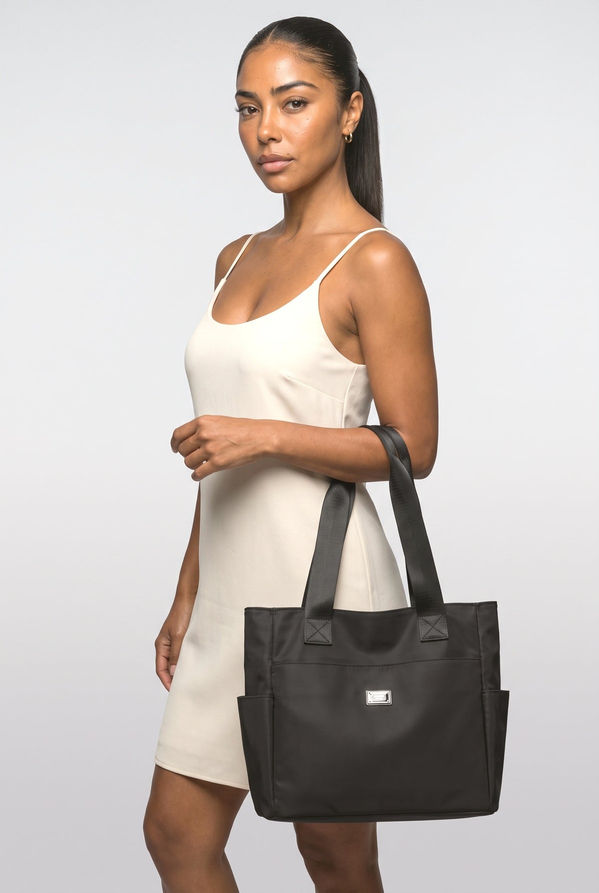 Shoulder Bag, worn, shown to scale