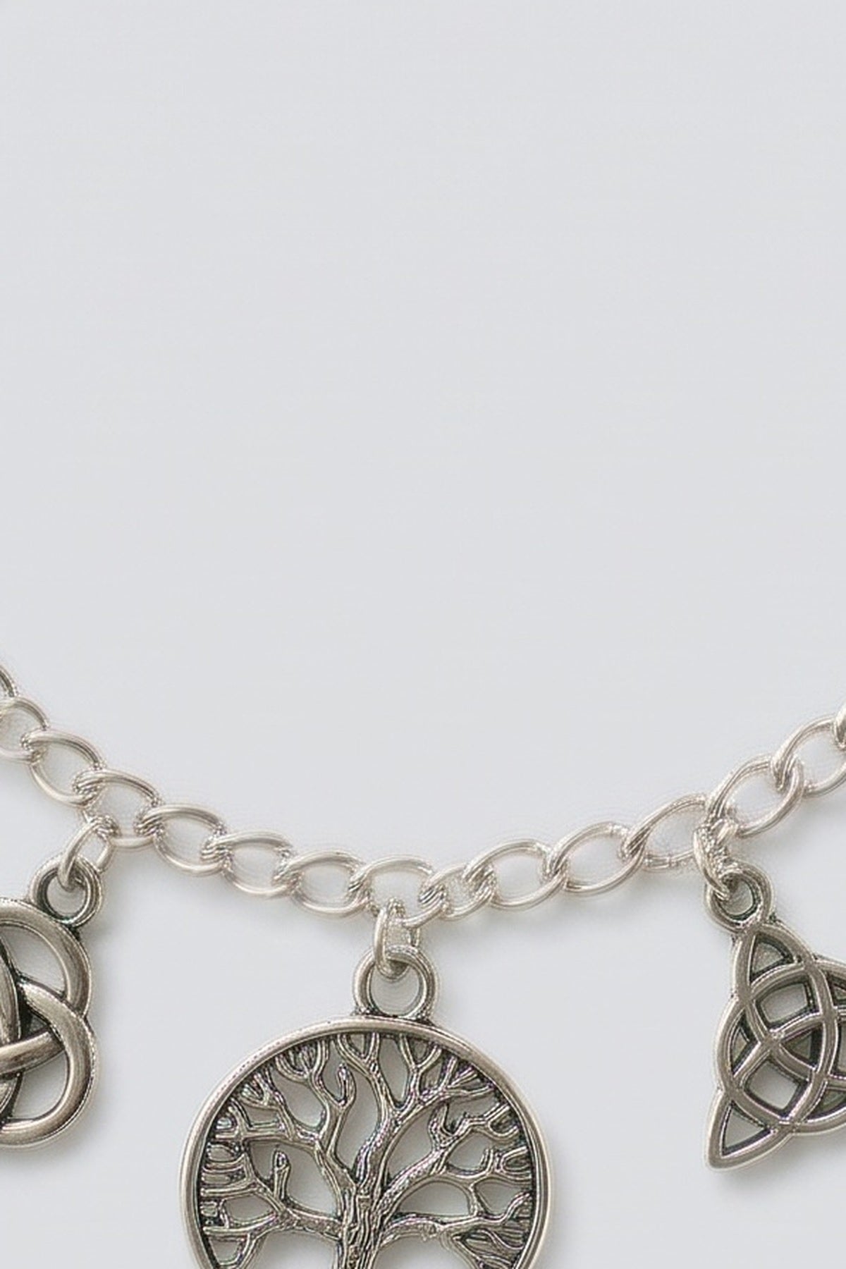 Silver Charm Bracelet, fabric detail