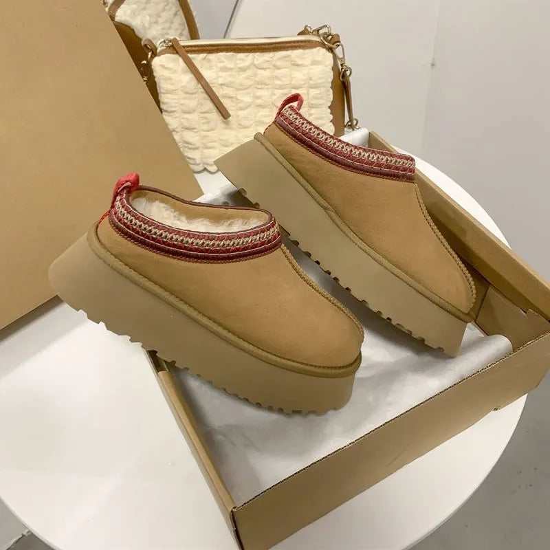 Tan platform slippers with red embroidered collar