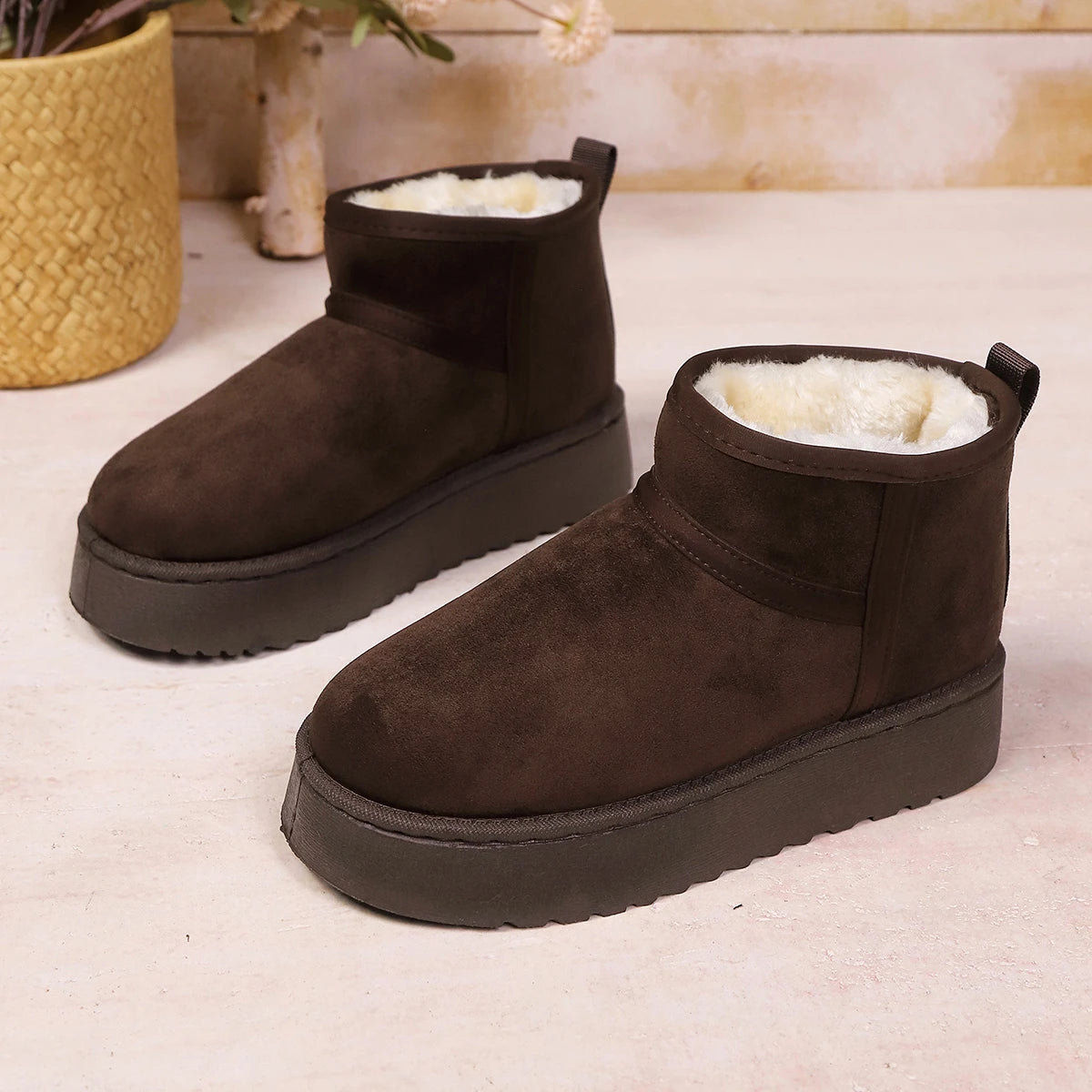 Brown platform mini boots, side view