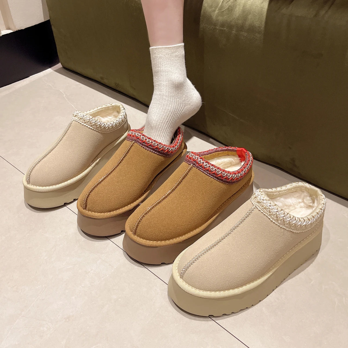 Cream and tan platform slippers side by side