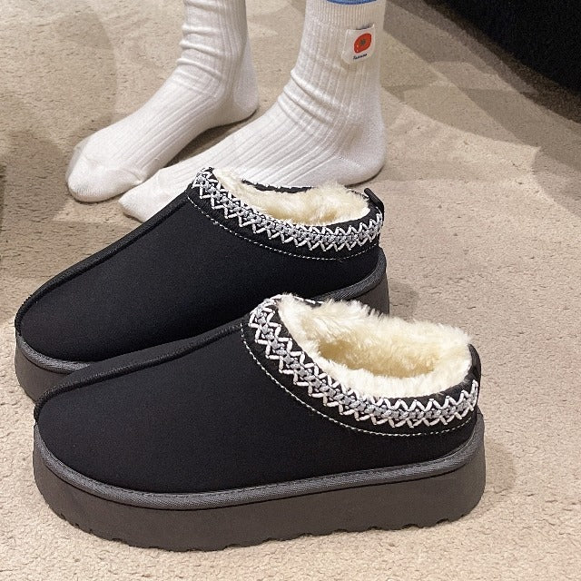 Black platform slippers with white embroidered collar